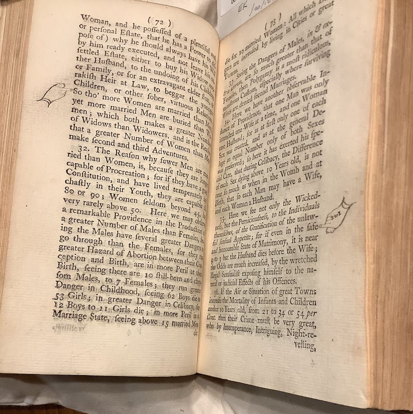 A photograph of a double page spread from 'Short's Observations' including marginalia of pointing fingers drawn in pencil.