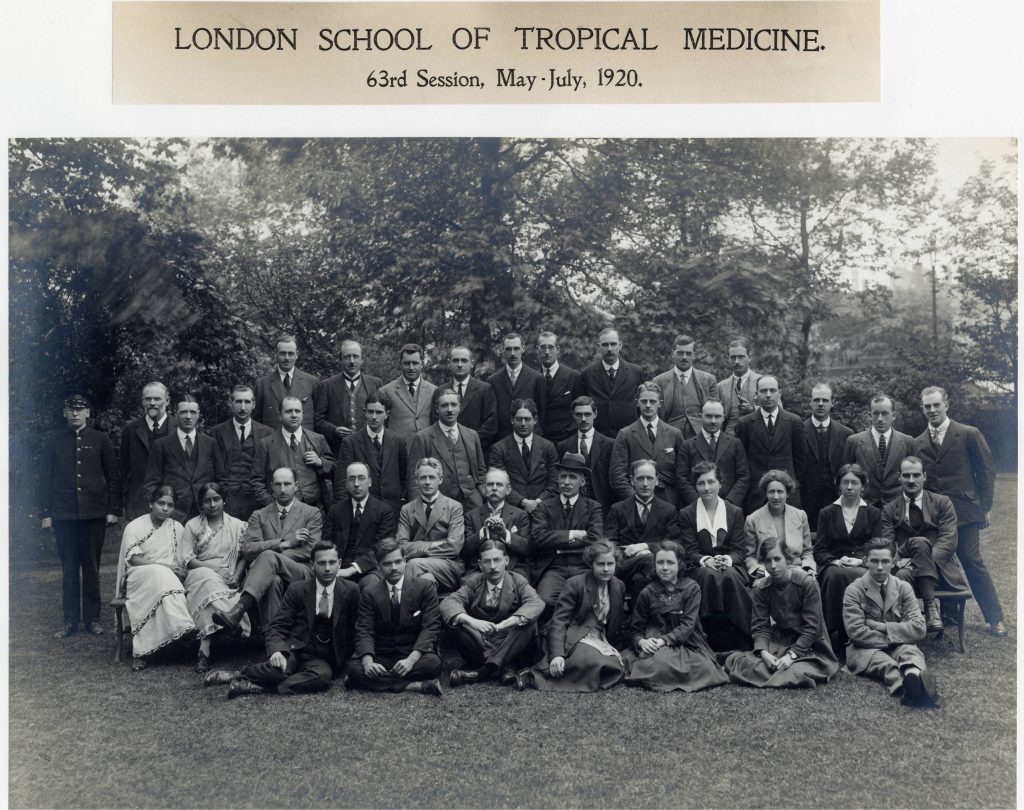 Black and white photograph of the 63rd Session at LSHTM. Shows four rows of men and women and M.S. Gore and A.S. Gore in Indian clothing on the second row.